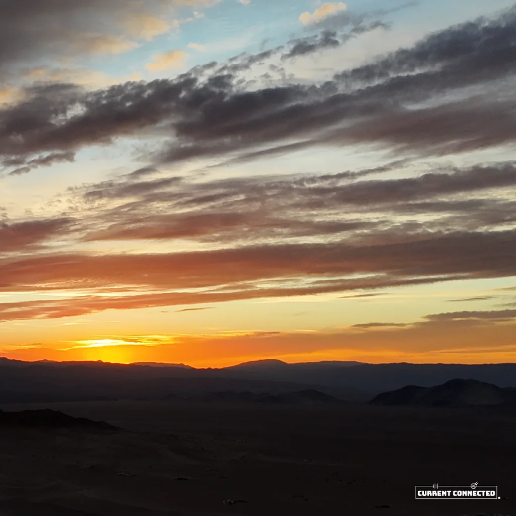 A photo of a dark sunset on a short day.